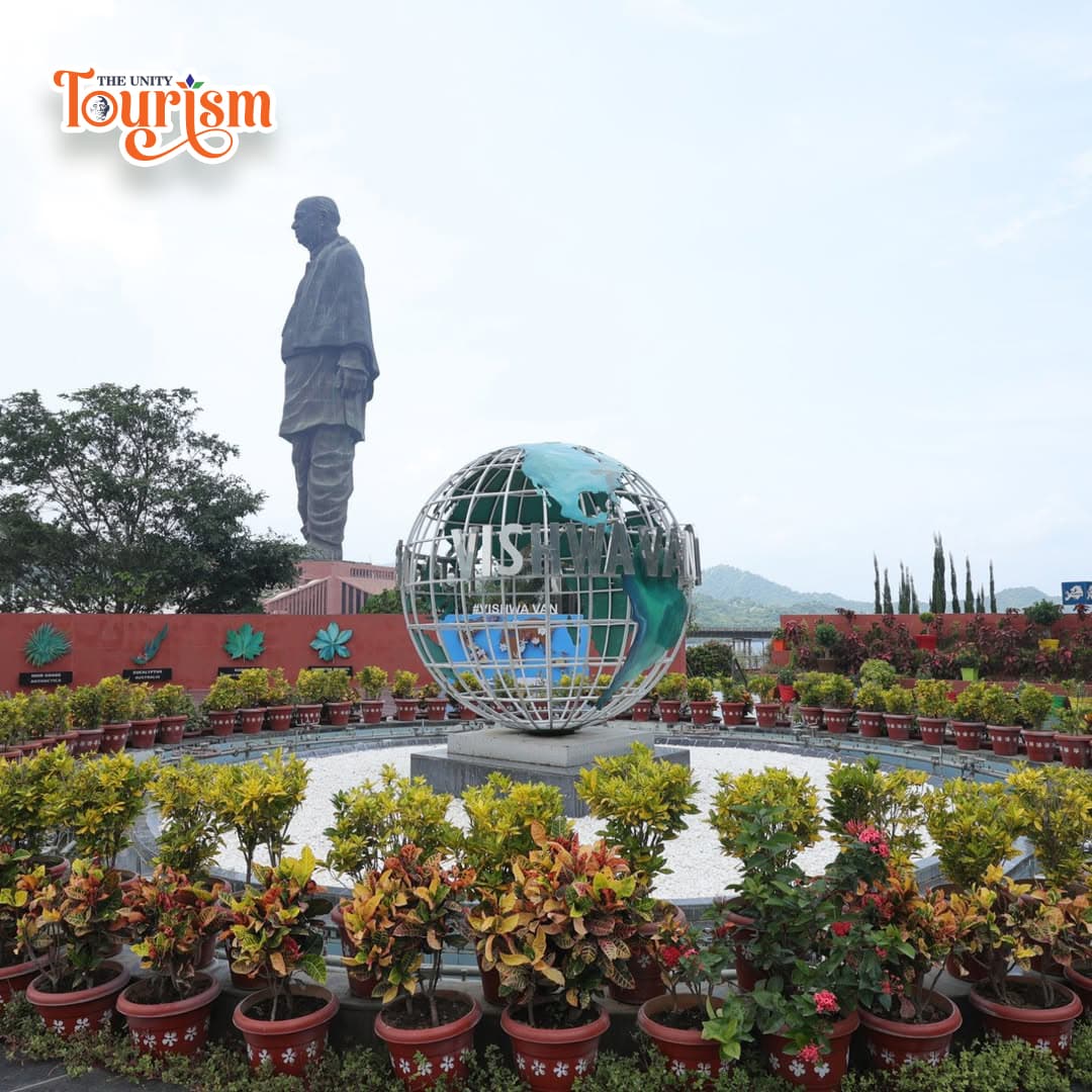 Vishwa Van globe monument with Statue of Unity in the background