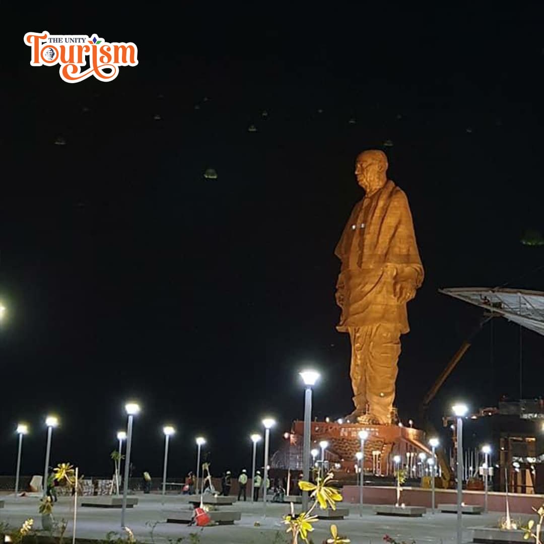 Spectacular night laser show with patterns projected on the Statue of Unity.