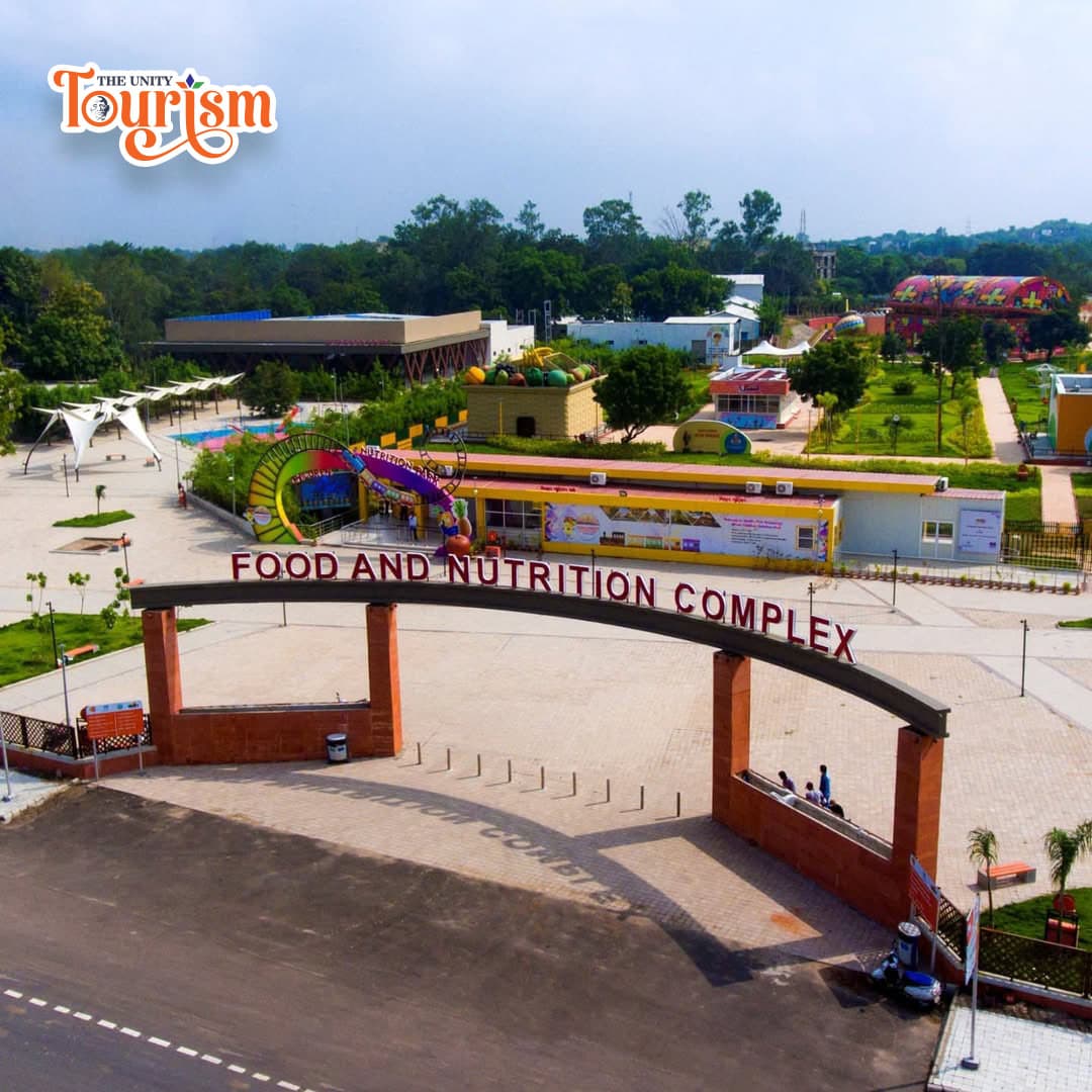 Entrance view of Food and Nutrition Complex at Statue of Unity with colorful exhibits and gardens