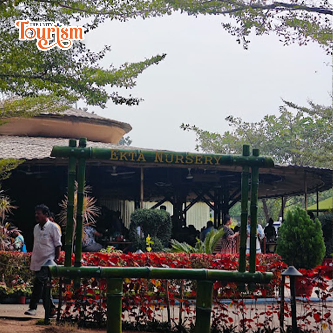 Well-maintained plant nursery with flower pots and greenery at Statue of Unity