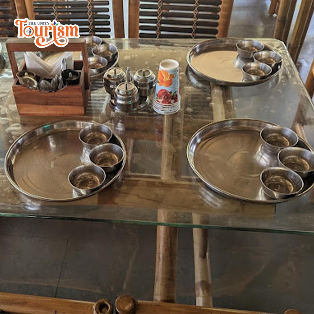 Well-decorated Ekta Tribal Café interior serving Ekta Thali at Ekta Nursery