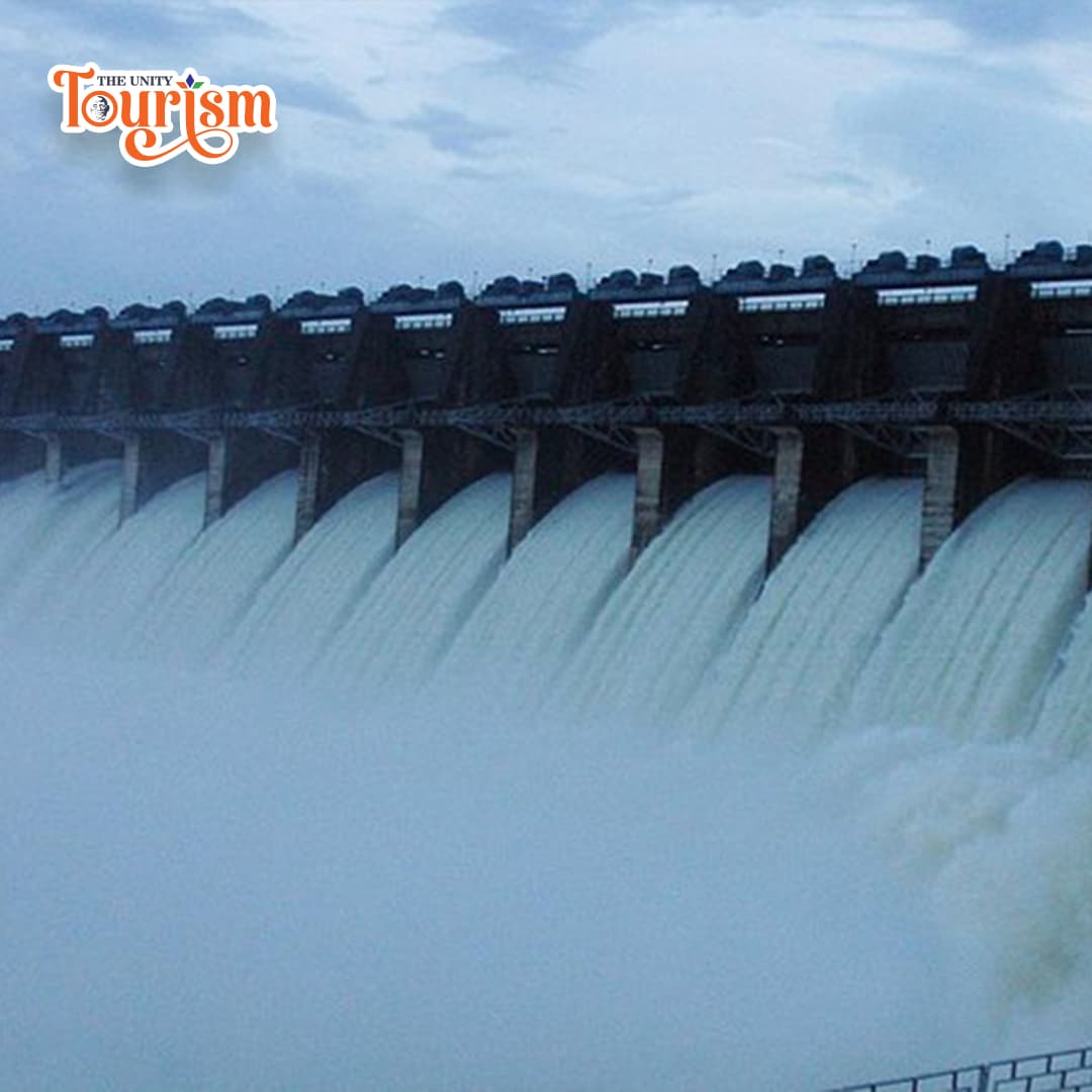 Tourists capturing photos of Sardar Sarovar Dam from scenic View Point 1 near Statue of Unity.