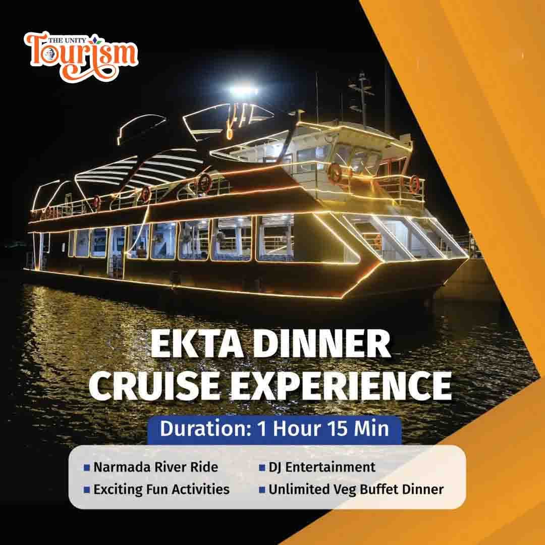 Ekta Dinner Cruise boat illuminated with vibrant lights on the Narmada River at night