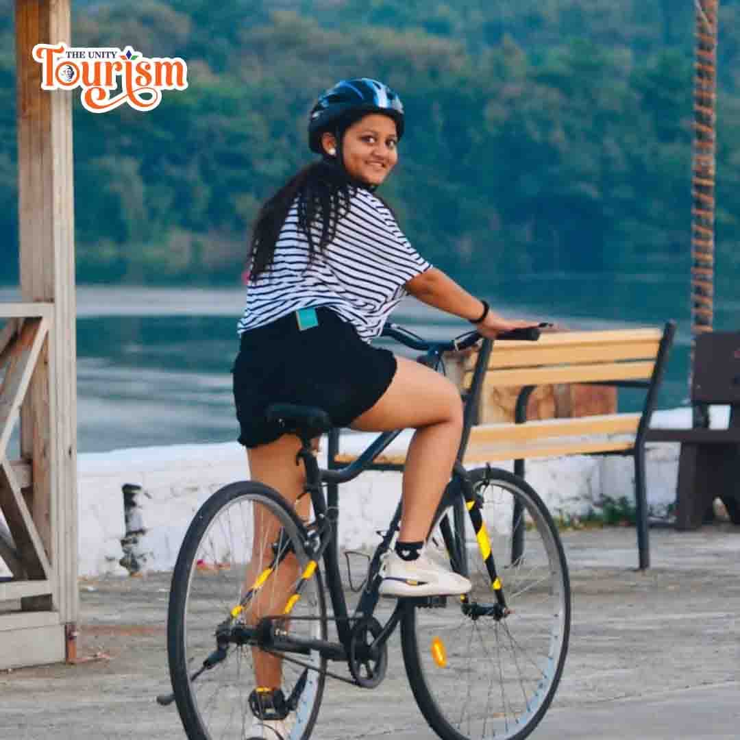 Scenic couple cycling experience at Statue of Unity riverfront