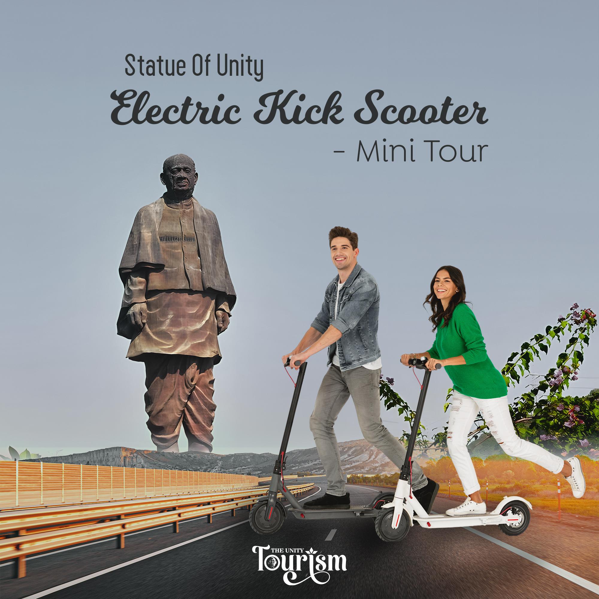 Couple riding electric kick scooters on a scenic road during Statue of Unity mini tour