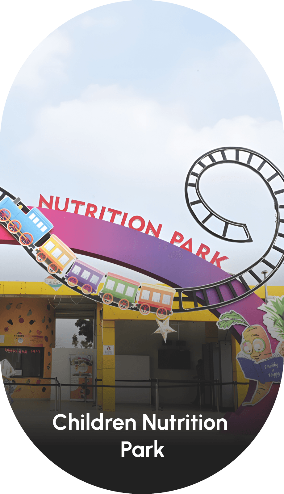 Entrance of Children Nutrition Park at Statue of Unity with colorful train-themed arch and vibrant design